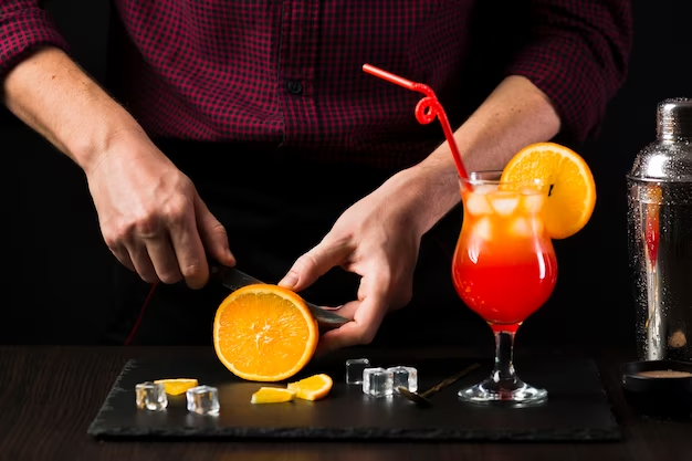 A man is making a cocktail