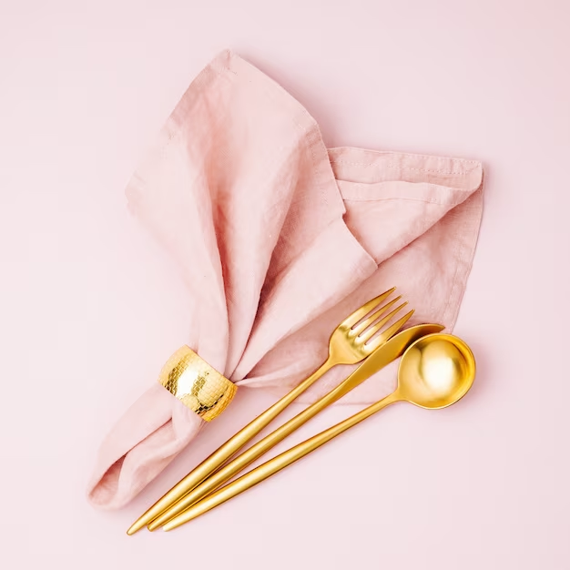 Pink napkin with cocktail tools