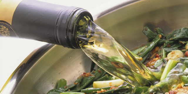 Wine is poured into the dish, close-up