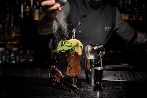 A man is making a cocktail